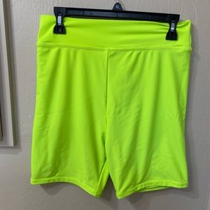 Good American size 4 which is a size XL. lime green bike shorts. NWOT